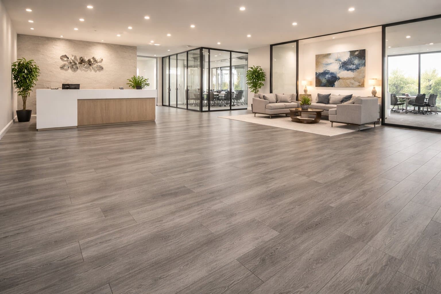 Commercial office lobby with greige luxury vinyl plank flooring design visualization.